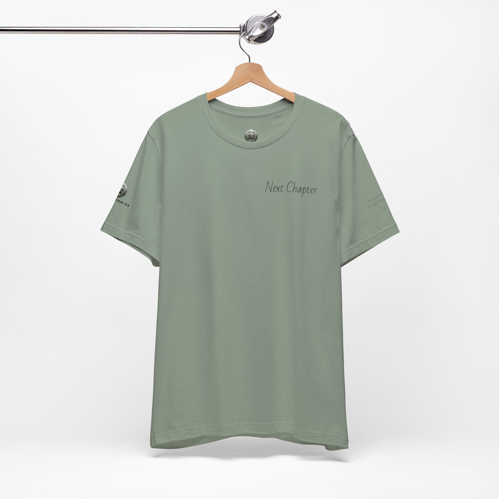 Next Chapter affirmation tee | Graphic open book back, inspirational sleeve text