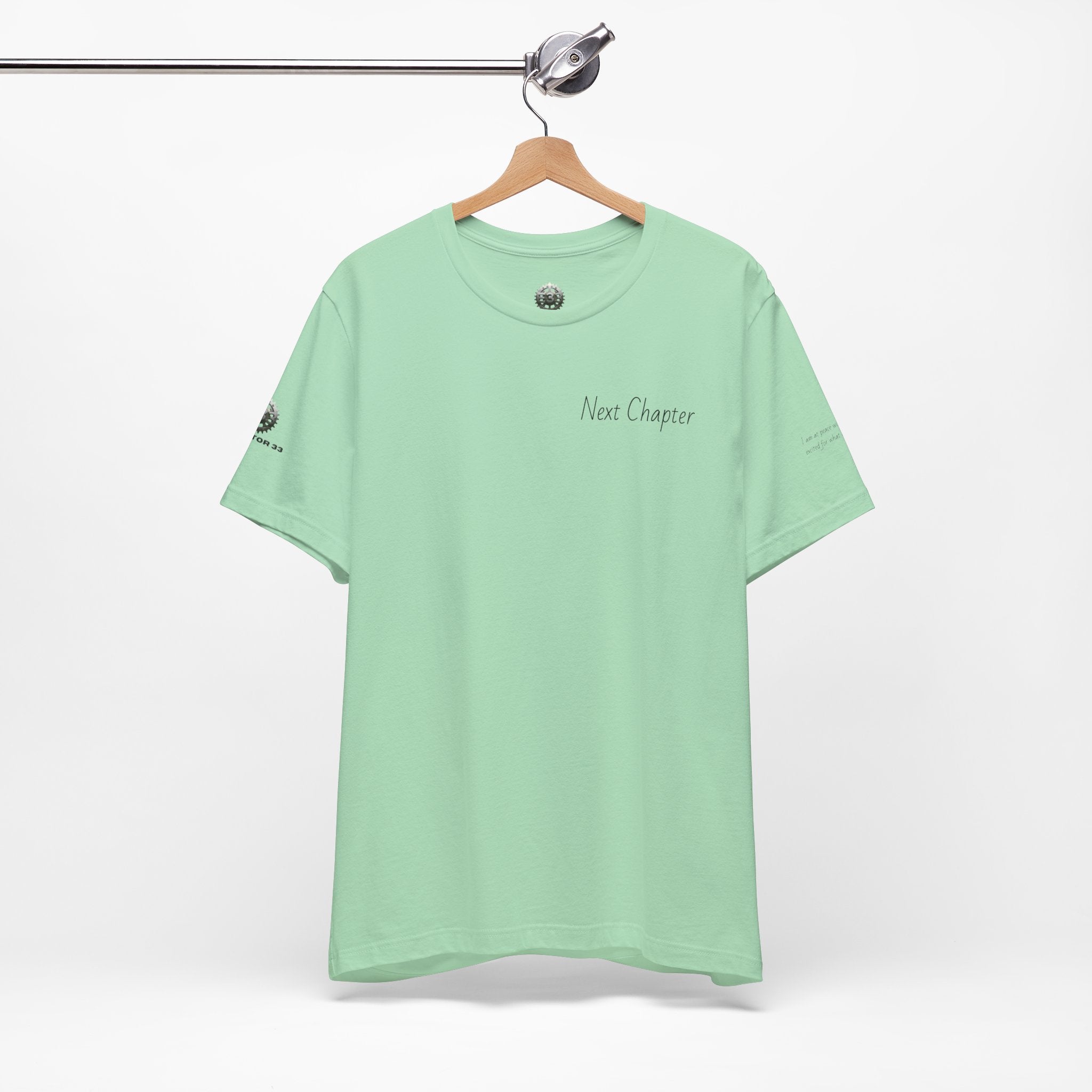 Next Chapter affirmation tee | Graphic open book back, inspirational sleeve text