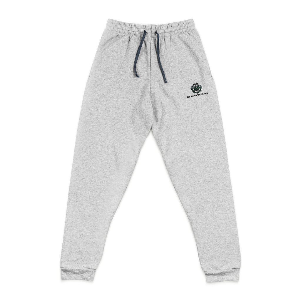Embroidered Tree Logo Joggers — Cozy Grey Sweatpants with Small Chest Stitching