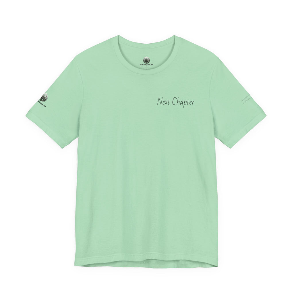 Next Chapter affirmation tee | Graphic open book back, inspirational sleeve text
