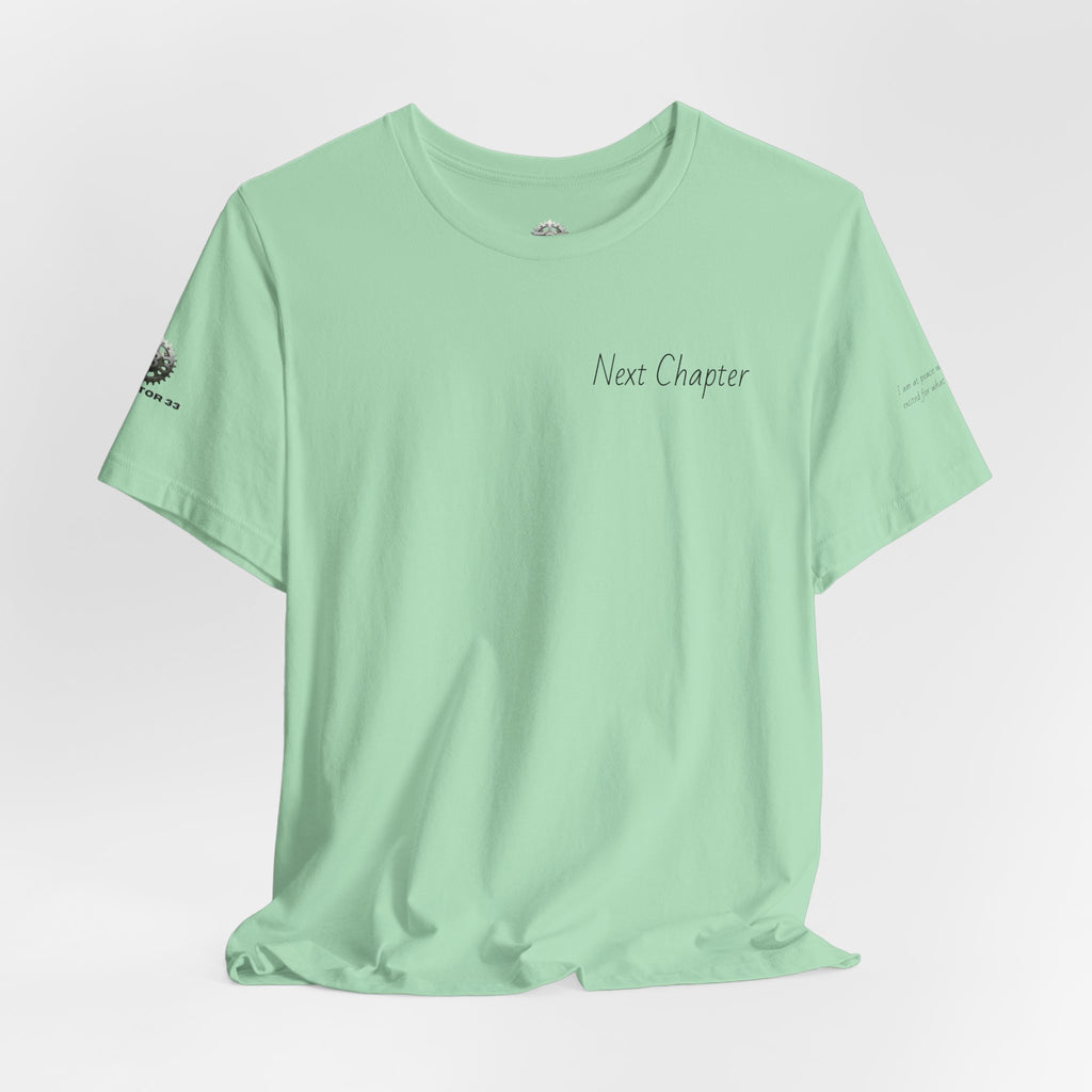 Next Chapter affirmation tee | Graphic open book back, inspirational sleeve text